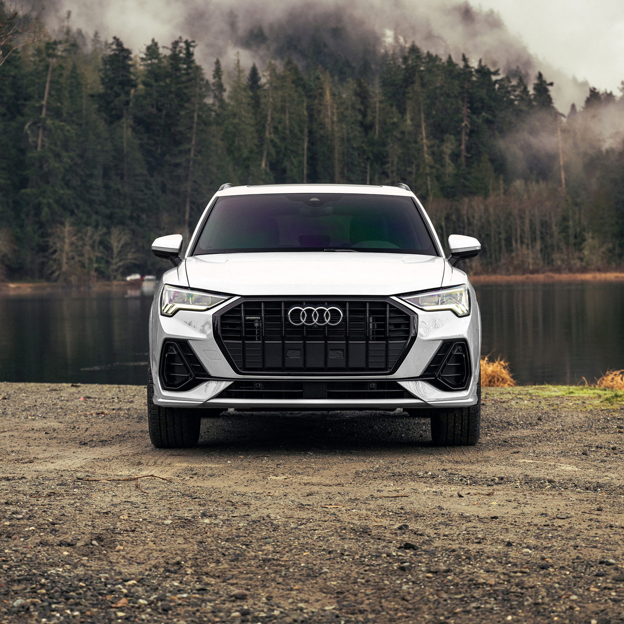 Three-quarter front view of a gray Audi Q4 e-tron.