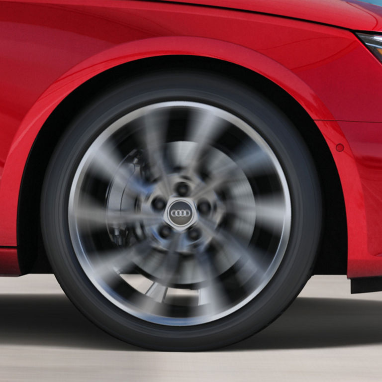 Close up of the wheel of the Audi A4 Sedan accelerating.