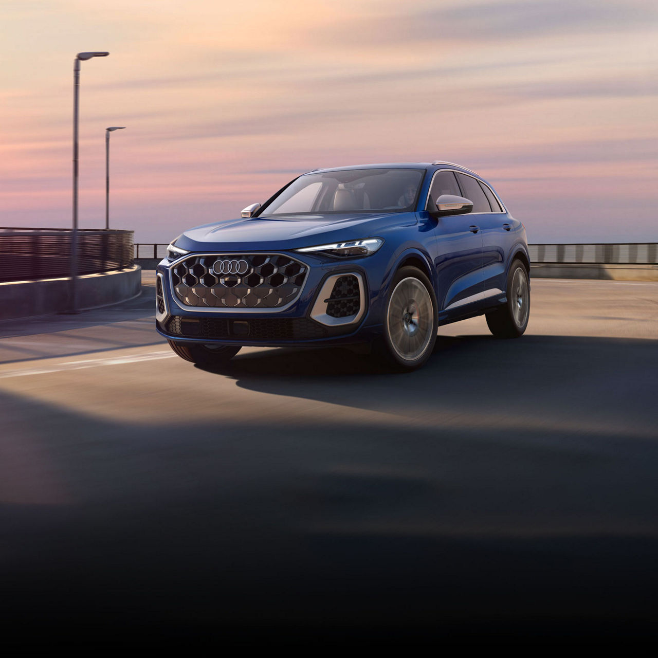 Side profile of the all-new Audi SQ5 accelerating.