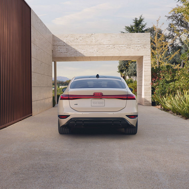 Close up rear profile of the Audi A6 e-tron parked.