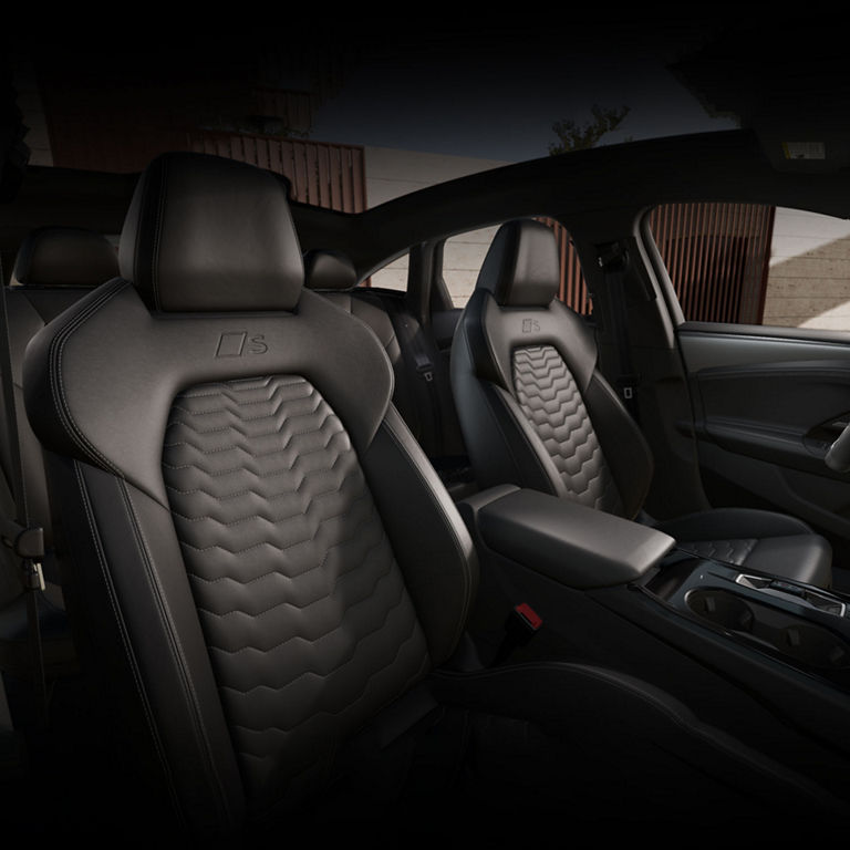 View of the interior cabin showing the leather seats of the Audi A6 e-tron.