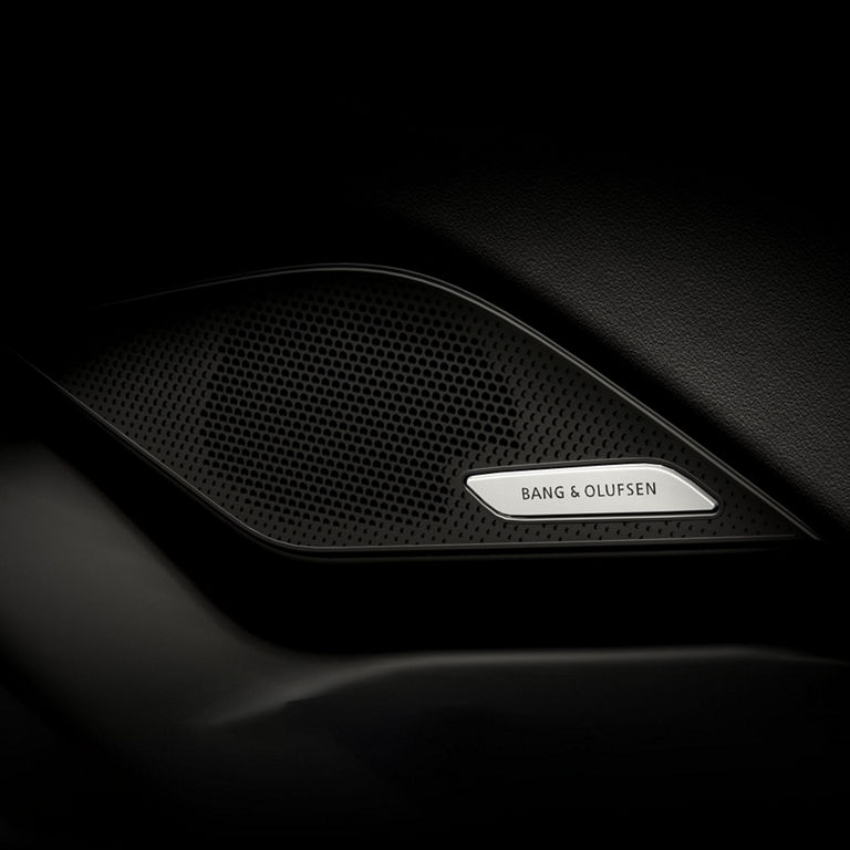 Close-up on a Bang & Olufsen speaker in the Audi A6 e-tron.