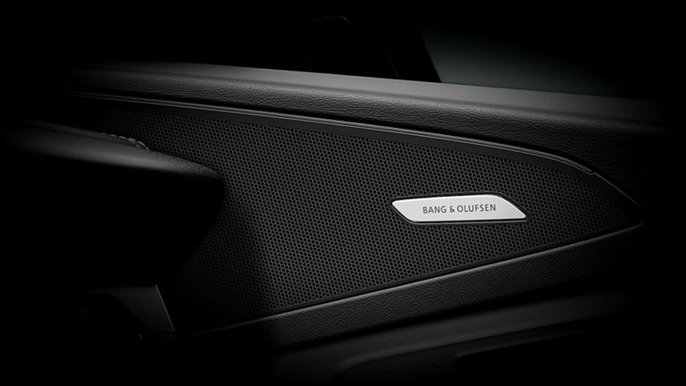 Close-up on a Bang & Olufsen speaker in the Audi Q6 e-tron.