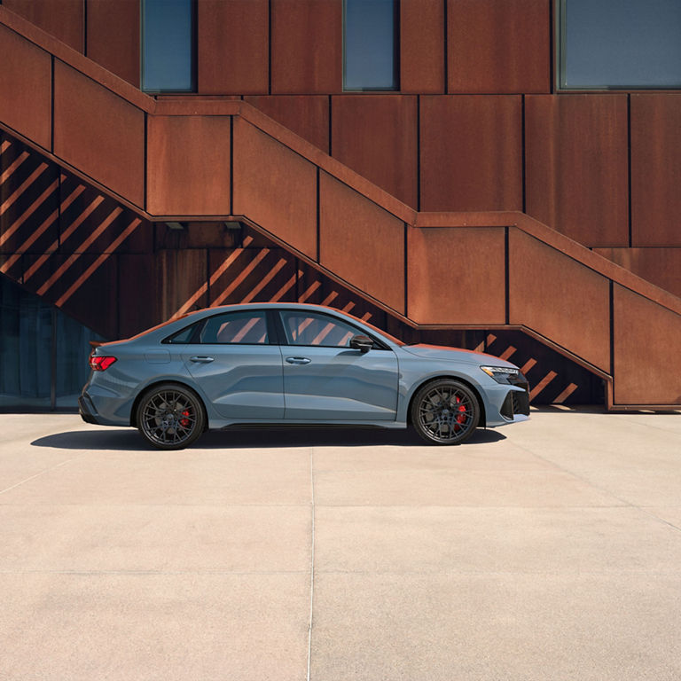 Side view of the Audi RS3 parked. 