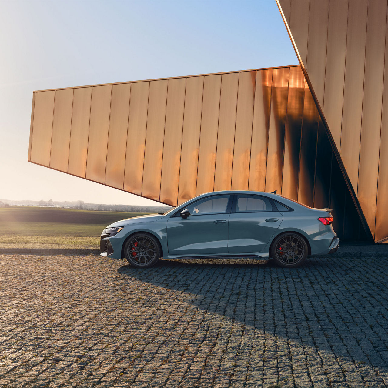 Side view of the Audi RS 3 parked. 