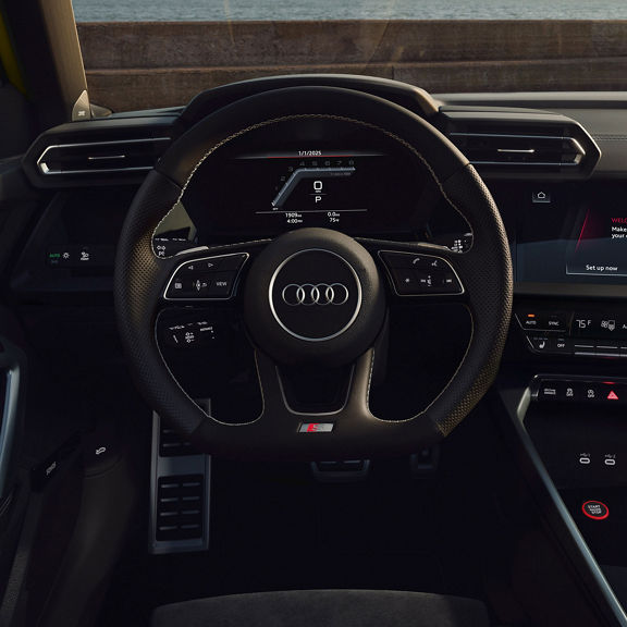 Close-up of the Audi S3 virtual cockpit and steering wheel.