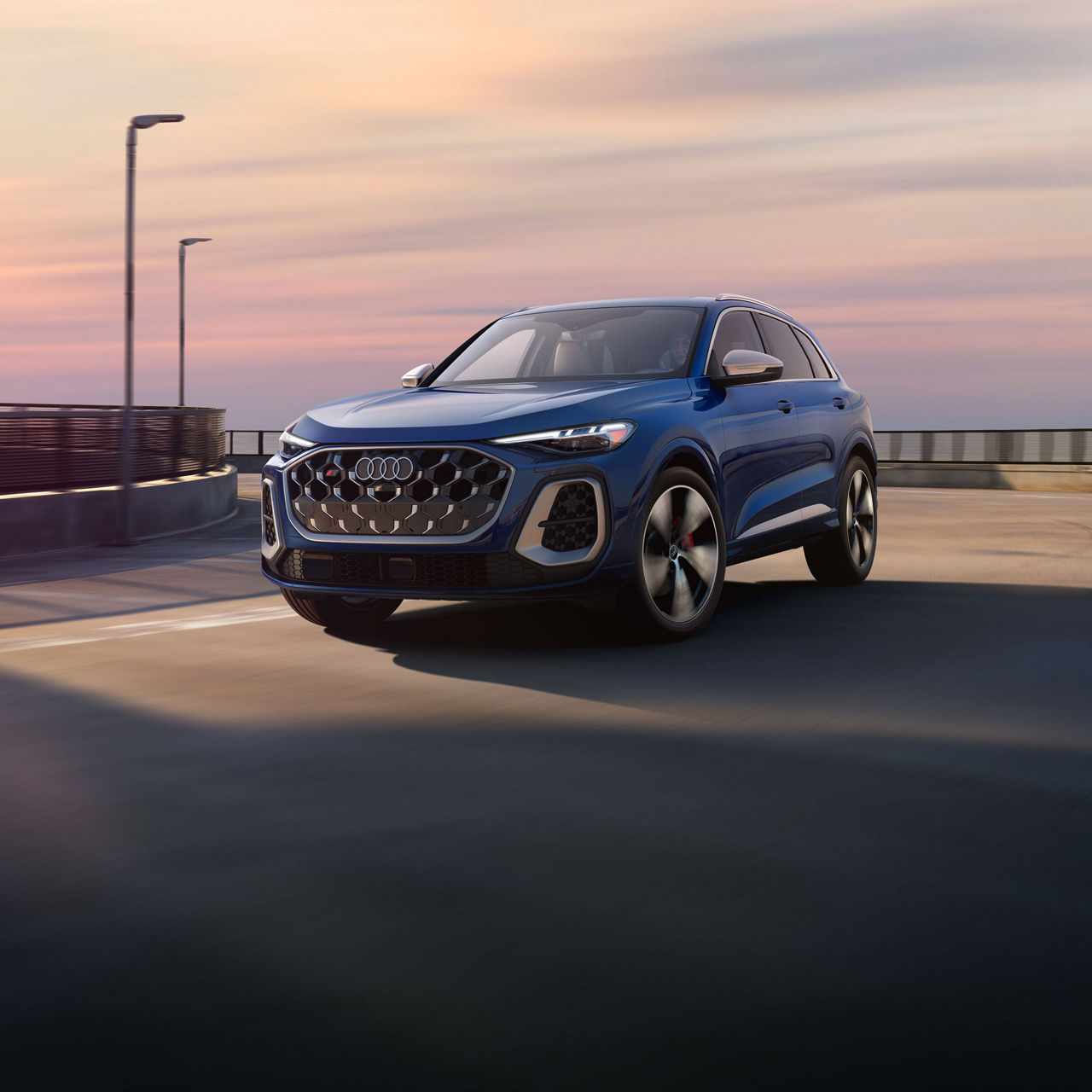Three-quarter front view of the Audi SQ5 in motion.