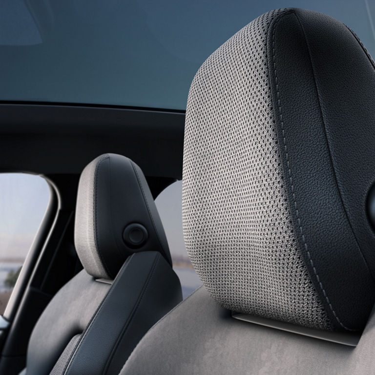 Close-up of the Bang & Olufsen® speakers in the headrest in the Audi A6 Sportback e-tron.