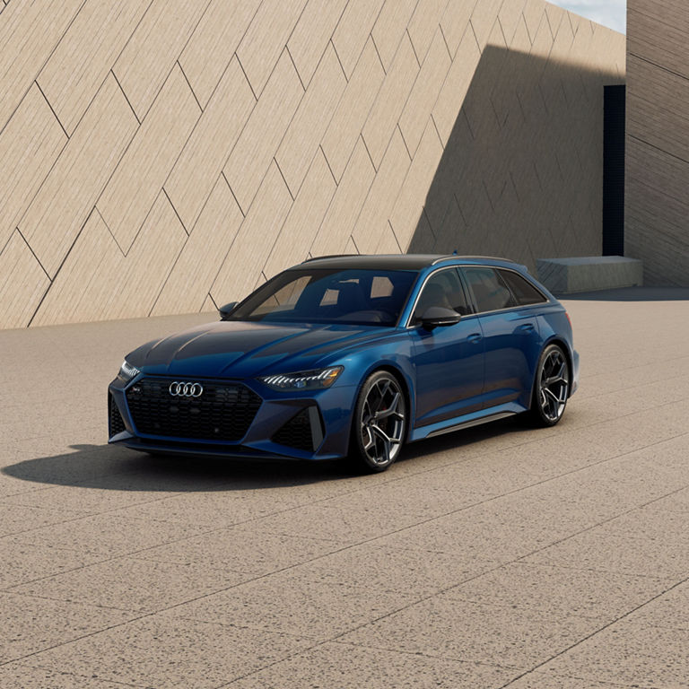 Front 3/4 view of the Audi RS 6 Avant performance parked.