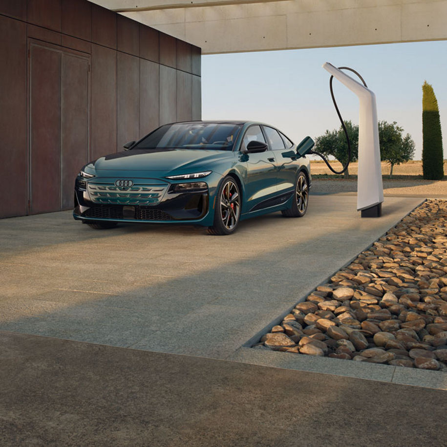 3/4 front view of the Audi S6 Sportback e-tron chatging.
