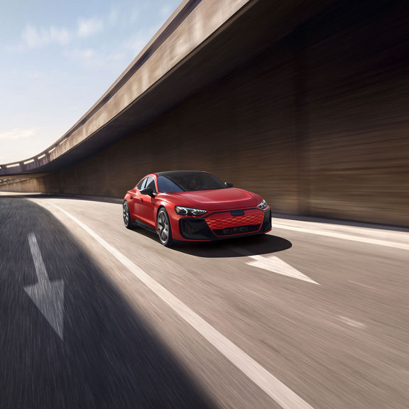 Front view of the Audi RS e-tron GT in motion.