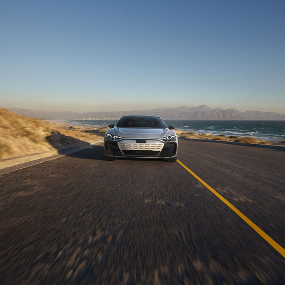 Front profile of the Audi S e-tron GT accelerating. 