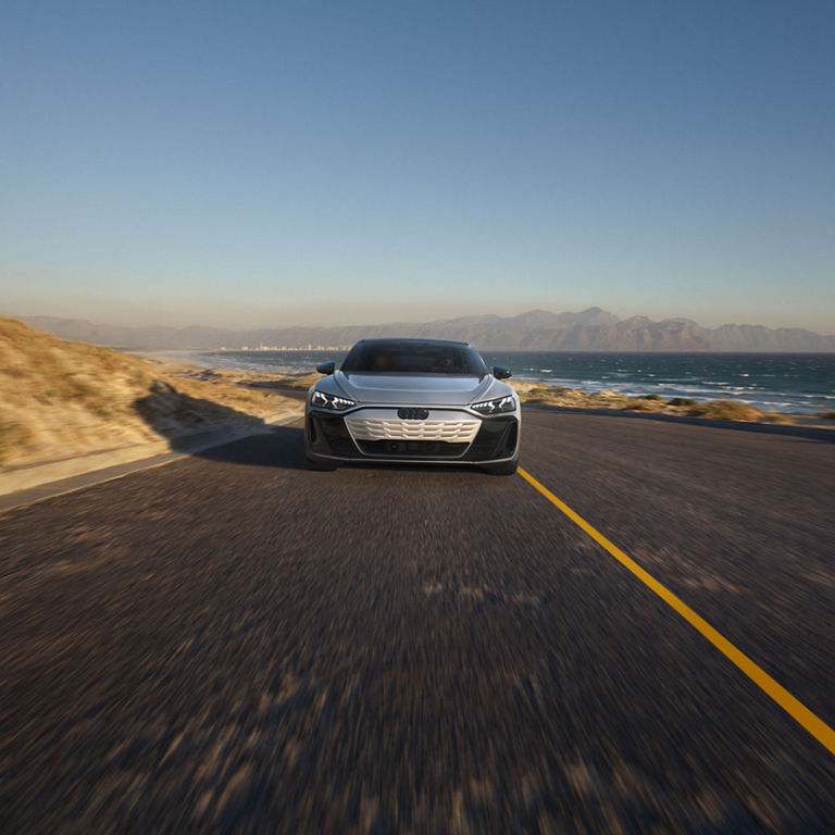 Front profile of the Audi S e-tron GT accelerating.