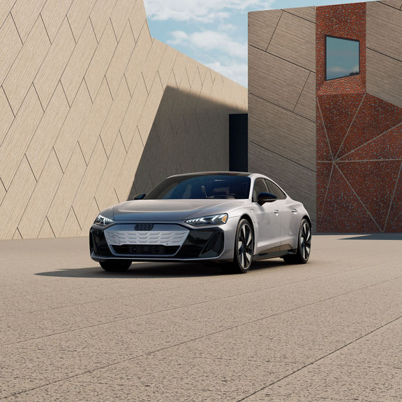 Three-quarter front view of the Audi S e-tron GT parked.