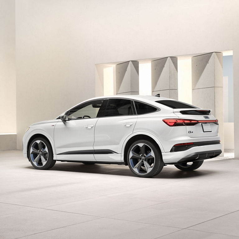 Three-quarter rear view of the Audi Q4 Sportback e-tron.