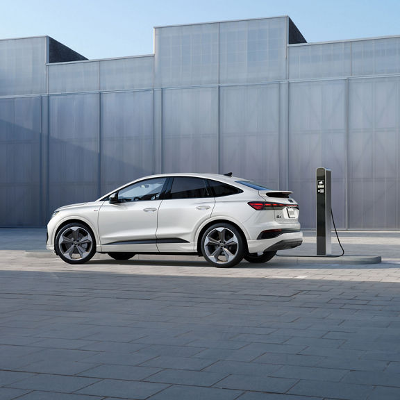 Side profile of the Audi Q4 Sportback e-tron® charging.