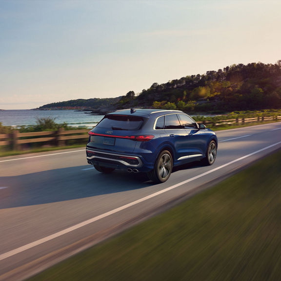 Rear 3/4 of the Audi SQ5 in motion.