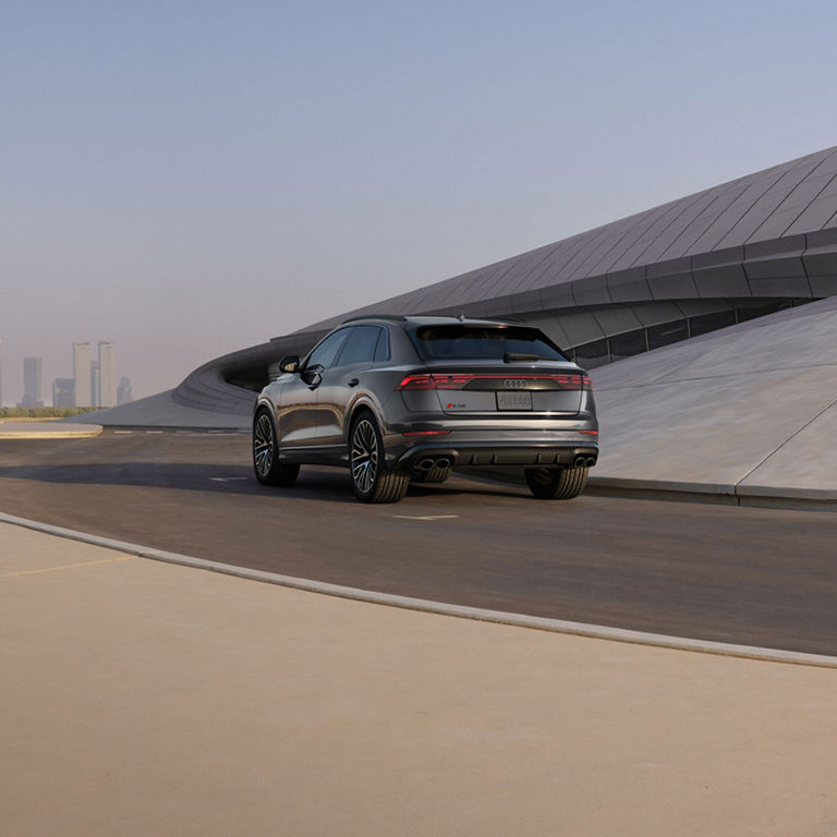 Rear view of the Audi SQ7 accelerating.