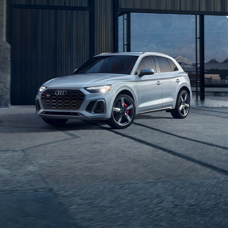 Three-quarter front view of the Audi SQ5 parked.