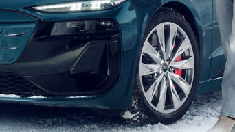 Close up on the tire of an Audi vehicle. 