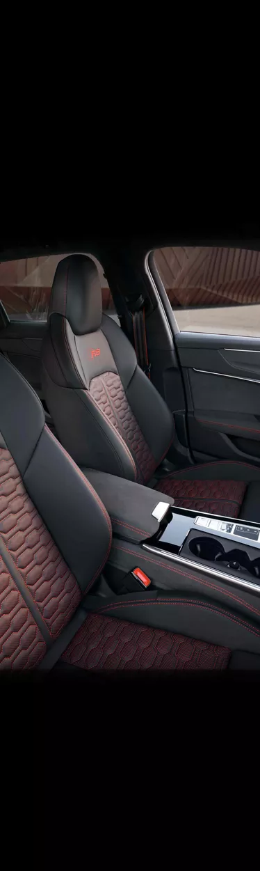Interior shot of the cockpit and dashboard of an Audi. 