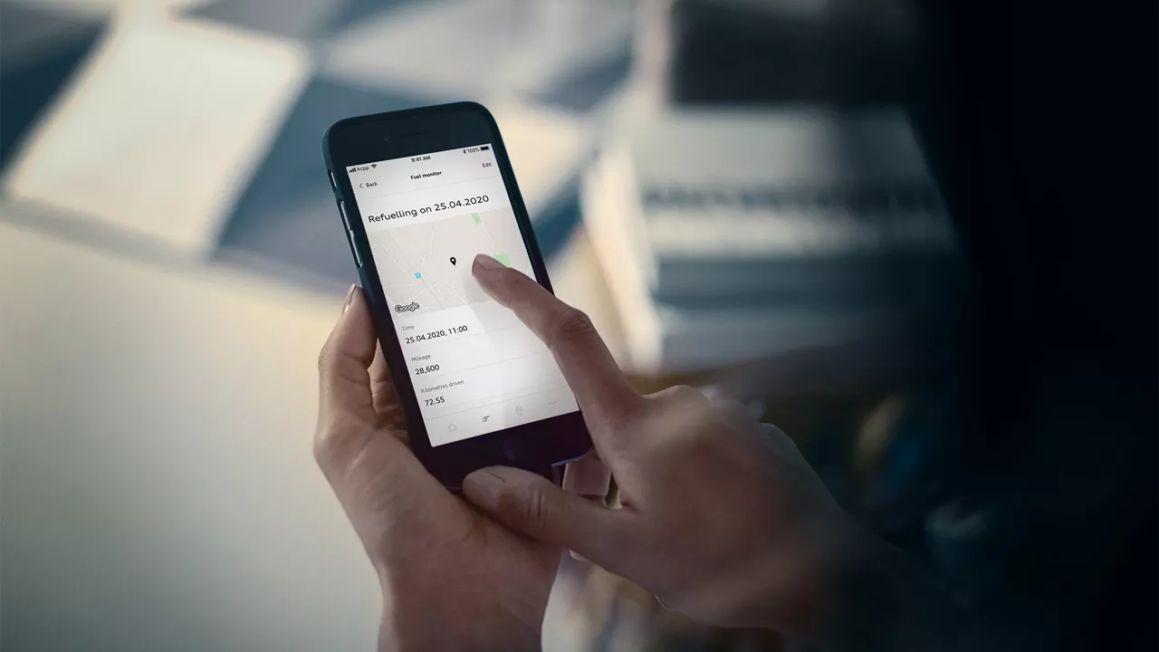 Audi service technician servicing a vehicle.