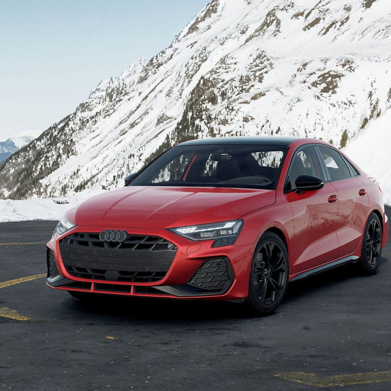 Front three-quarter front view of the Audi A3 parked.