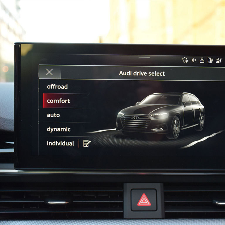 Close up of the MMI screen displaying the Audi drive select menu.