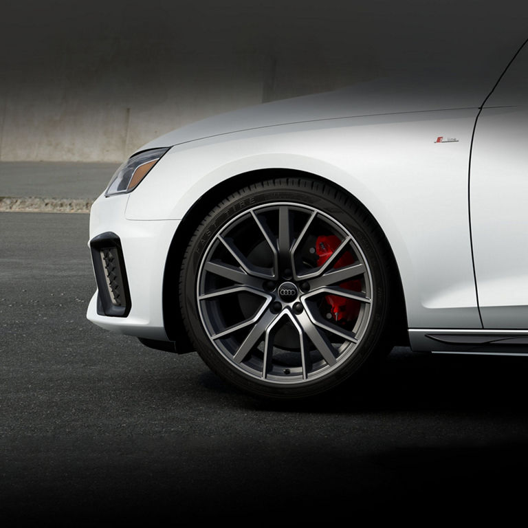 Close up on the front wheel of the Audi A4 Sedan.