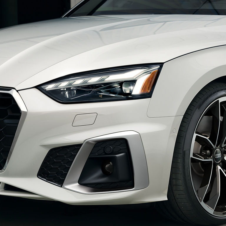 Close-up of the headlight on the Audi A5 Cabriolet.