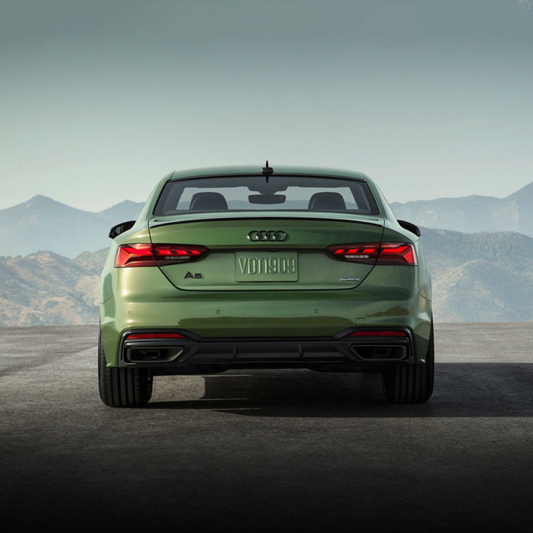 Rear-view of the Audi A5 Coupé parked.