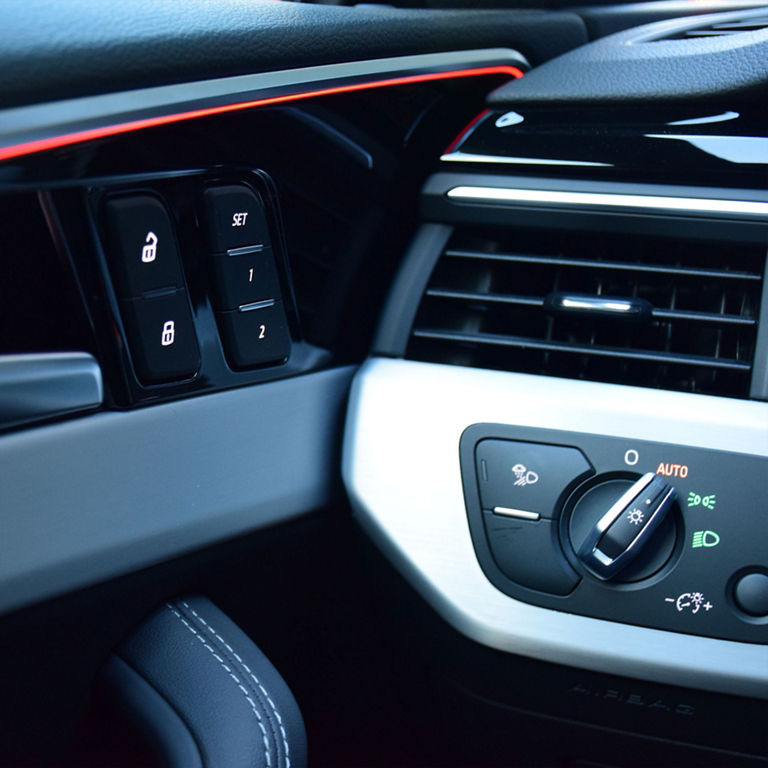 Interior view of the Audi A5 Sportback, showing the driver's cockpit, dashboard, and console.