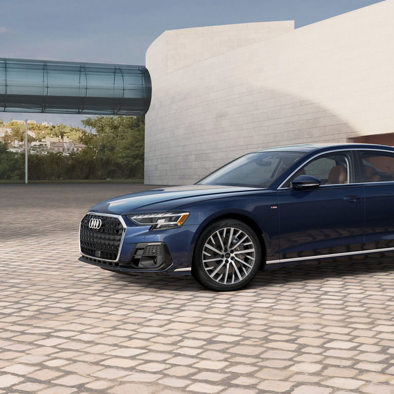 Side profile of the Audi A8 parked.