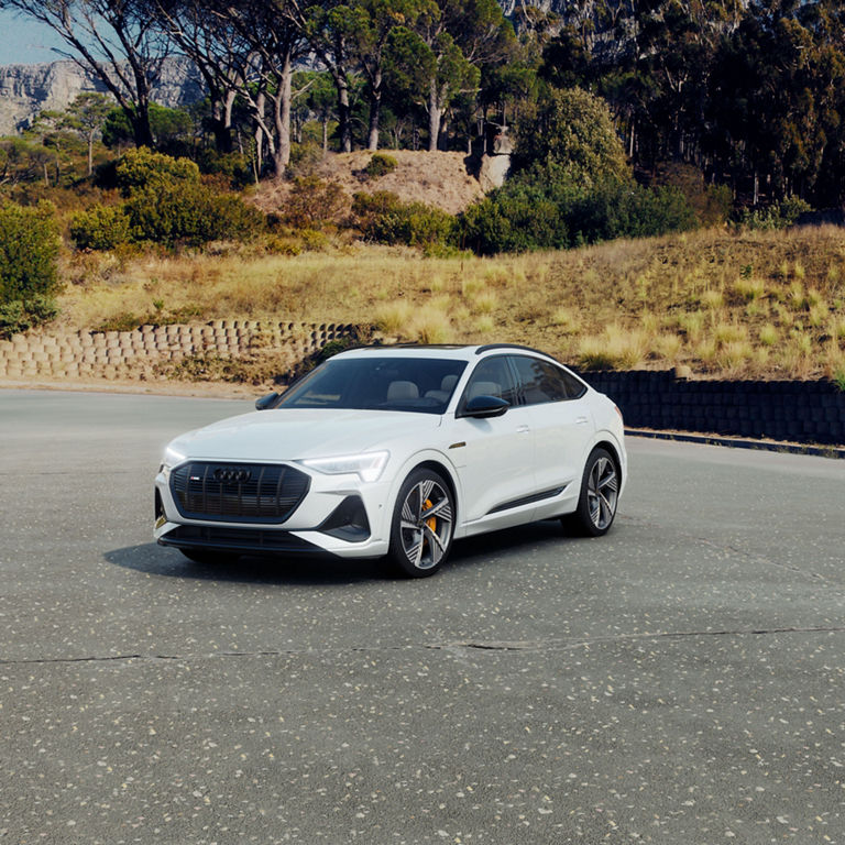 Three-quarter front profile of the Audi e-tron Sportback.