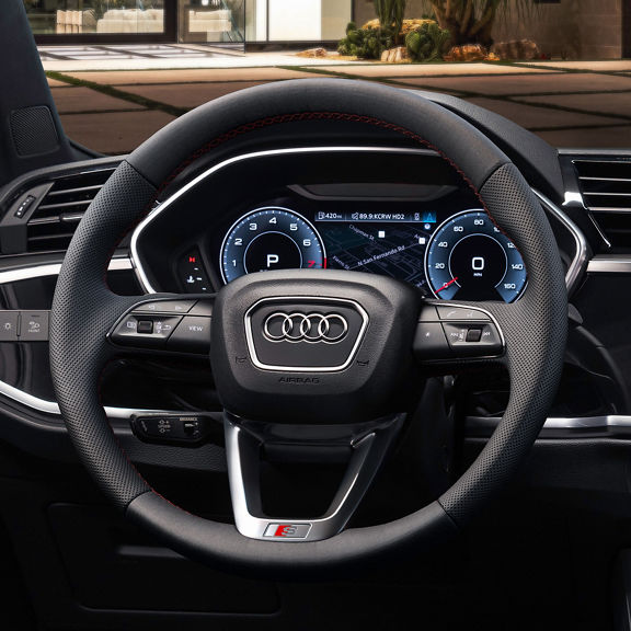 Interior view of the Audi Q3 cockpit.