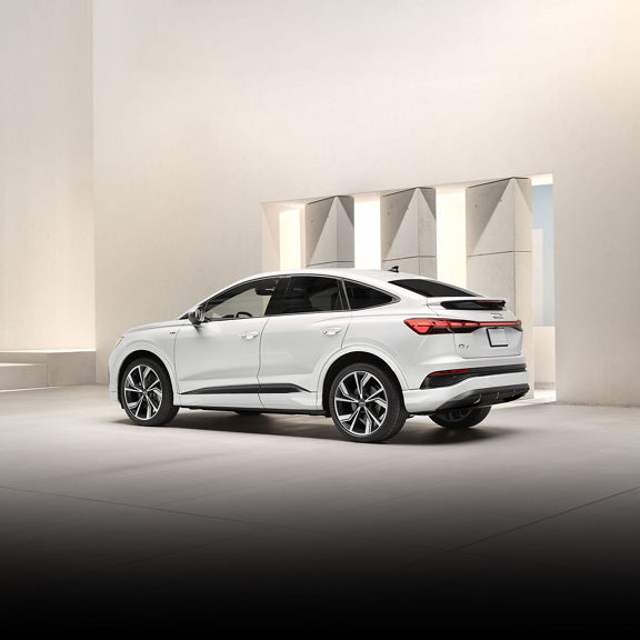 Three-quarter rear view of the Audi Q4 Sportback e-tron®.