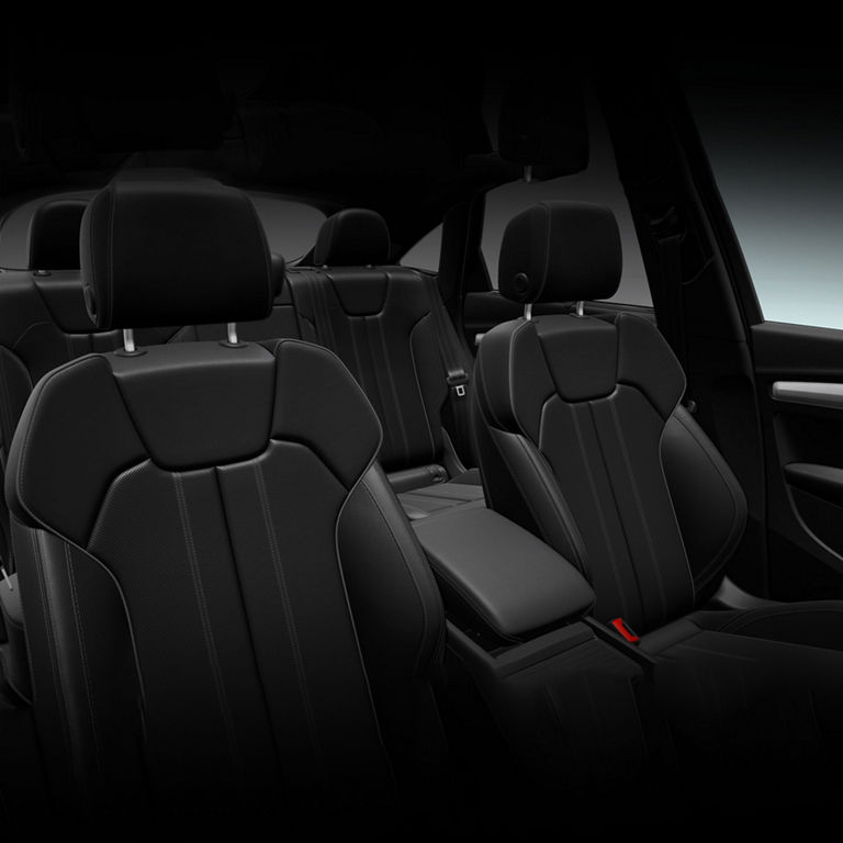 View of the interior cabin, showing the front seats, of the Audi Q5 Sportback.