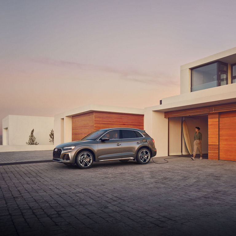 Side profile of the Audi Q5 PHEV charging.