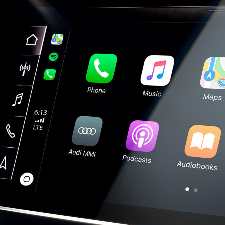 Close-up of the Apple CarPlay menu on the MMI screen of the Audi SQ5 Sportback. 