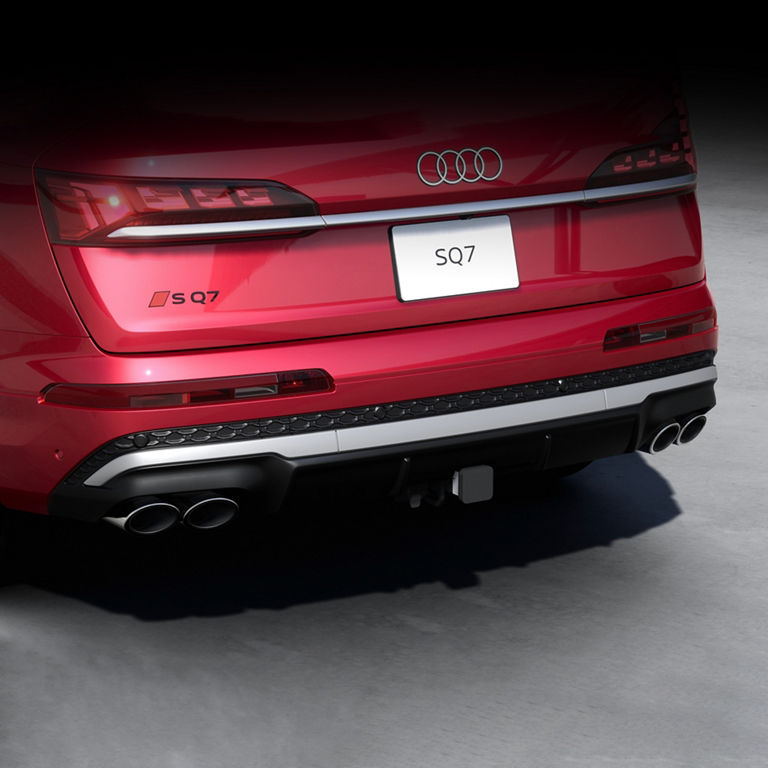 Close up on trailer hitch on red Audi SQ7.