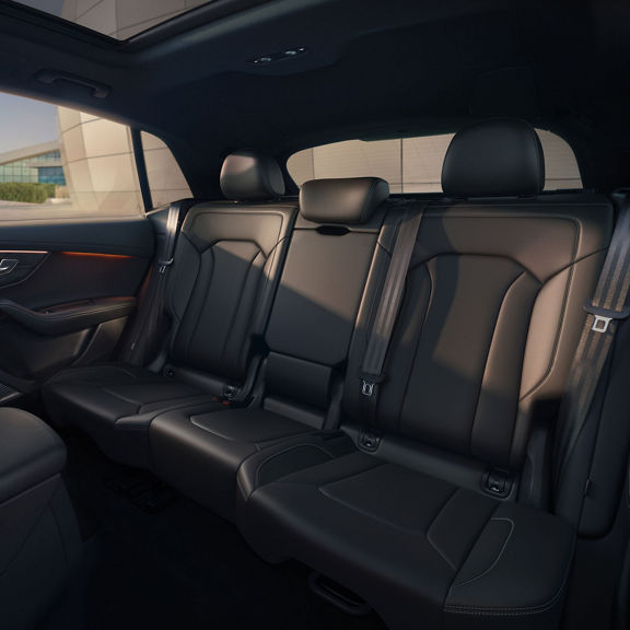 Interior view of the Audi Q8, showing the rear passenger seats.
