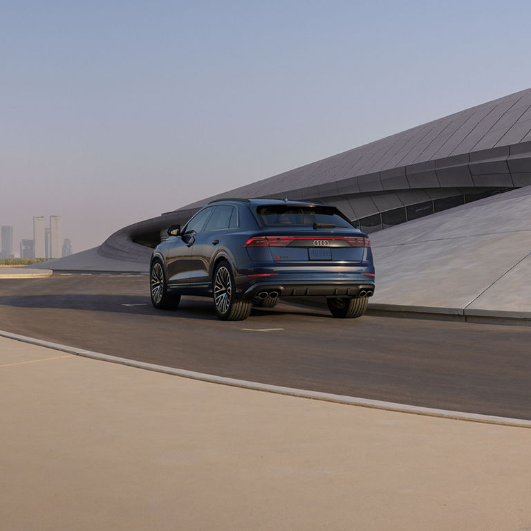 Rear view of the Audi SQ7 accelerating.