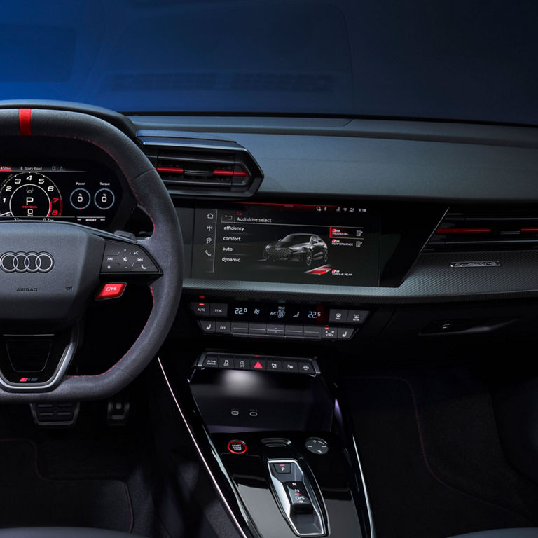 Close-up of the Audi drive select menu on the MMI display in the Audi RS 3. 