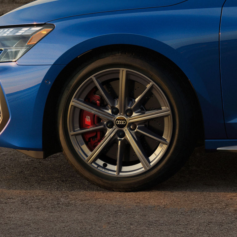 Close-up of the optional red brake calipers of the Audi S3.