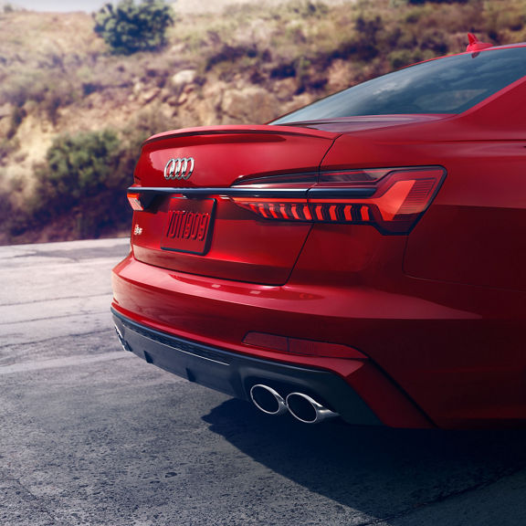 Close up on the rear bumper and exhaust of the Audi S6 Sedan. 