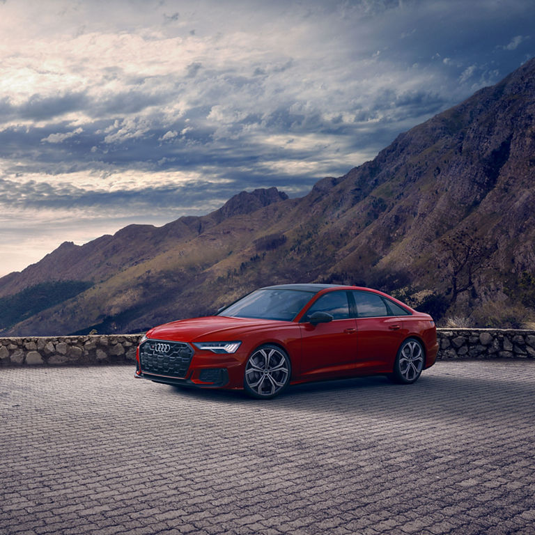 Three-quarter side view of the Audi S6 Sedan.