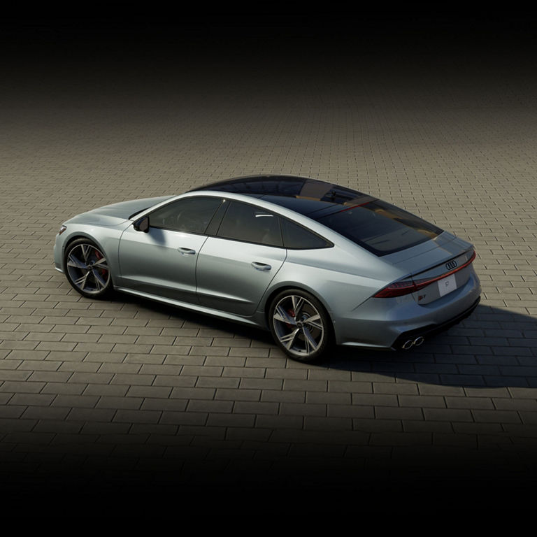 Vue aérienne arrière de l'Audi A7 garée.