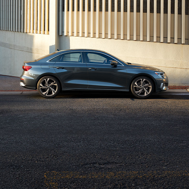 Side profile of the Audi A3 Sedan parked. 