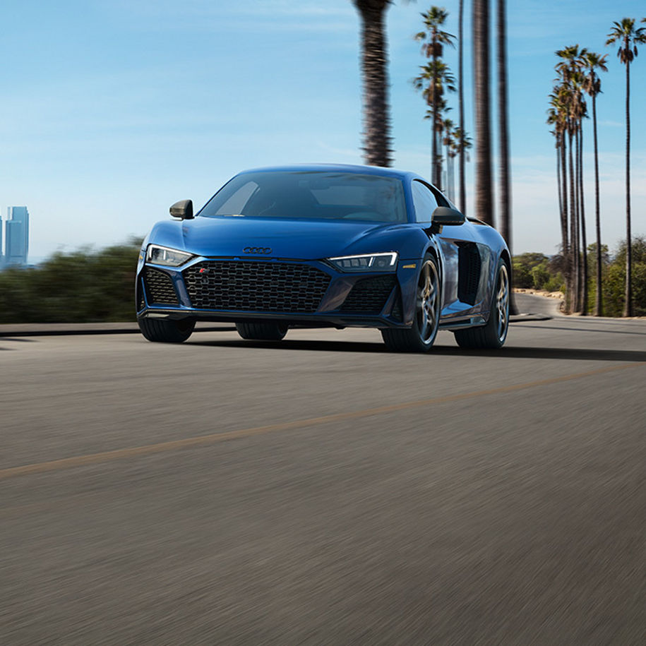 Front profile of the Audi R8 Coupé accelerating.
