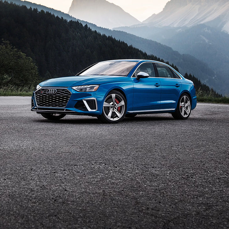 Three-quarter front view of the Audi S4 Sedan.